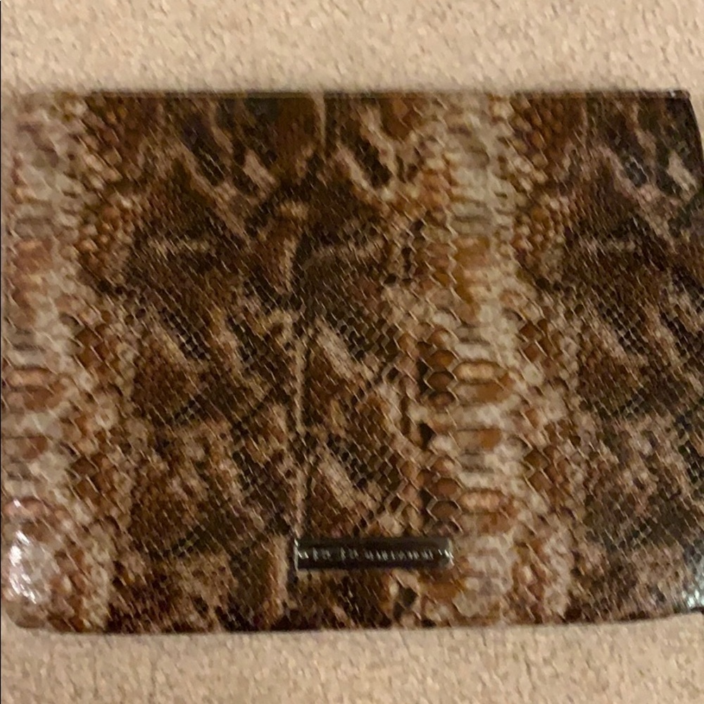 Snake skin brown black clutch